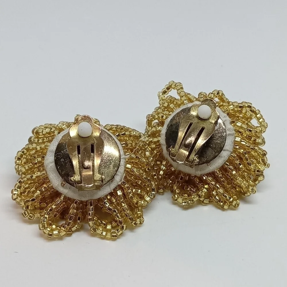 * vintage gold tone glass seed beads flower puff dramatic clip on earrings